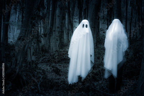 ghost in a dark forest Halloween background