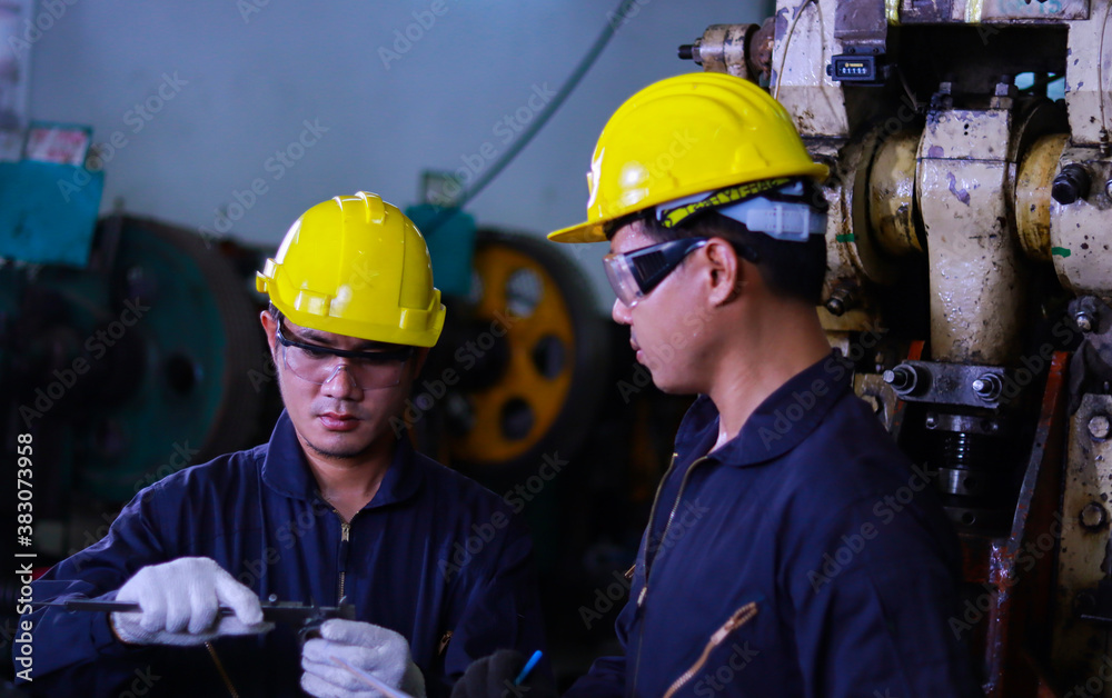 Asian male workers working