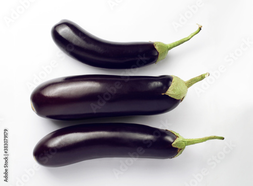 Fresh  eggplants on a  white background. Group. Top view