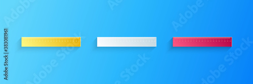 Paper cut Ruler icon isolated on blue background. Straightedge symbol. Paper art style. Vector.