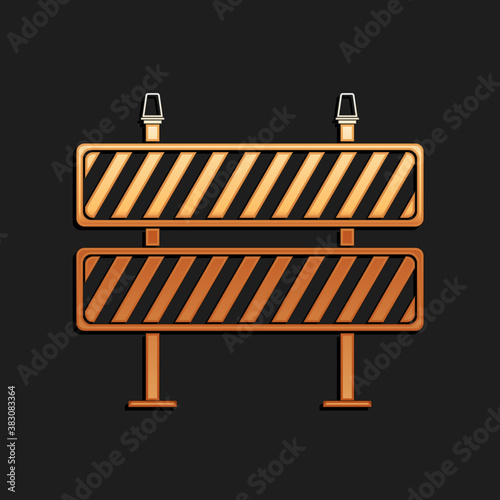 Gold Road barrier icon isolated on black background. Restricted area which are in under construction processes. Fence of building or repair works sign. Long shadow style. Vector.