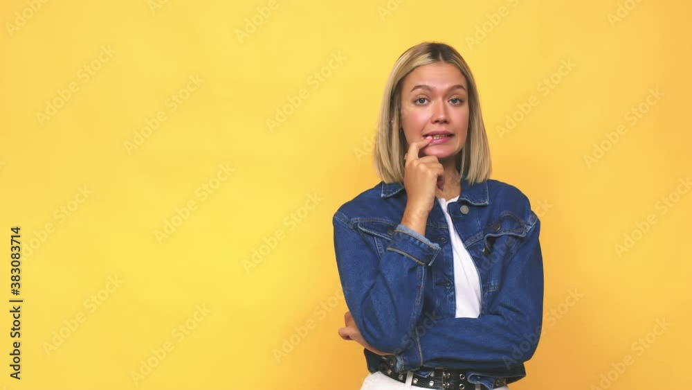 Young blonde caucasian woman relaxed thinking about something looking at a copy space Young blonde caucasian woman relaxed thinking about something looking at a copy space
