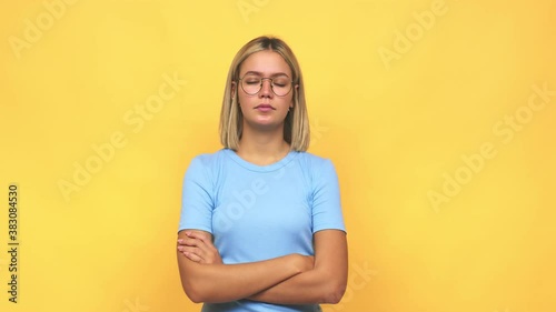 Young blonde caucasian woman tired of a repetitive task