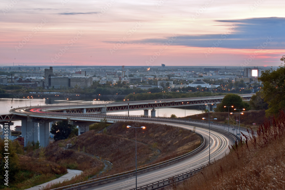 cars move in Nizhny Novgorod at sunset cars move in Nizhny Novgorod at sunset