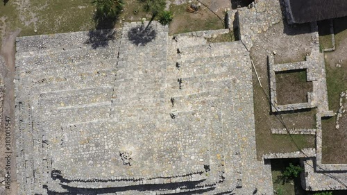 Aerial camera looking straight down onto the main pyramid of Xcambo Mayan ruins in Mexico. photo