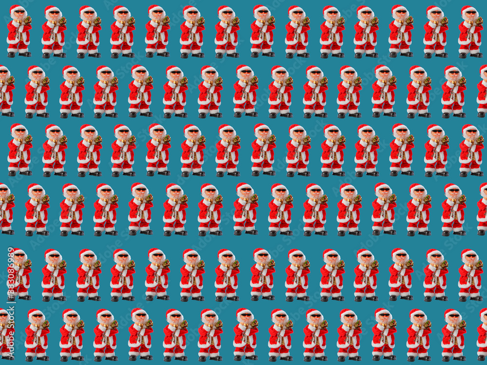 Christmas seamless pattern with Santa Claus on a blue background.