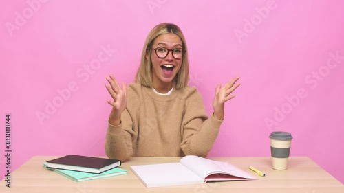 Young blonde caucasian woman celebrating a victory or success, he is surprised and shocked