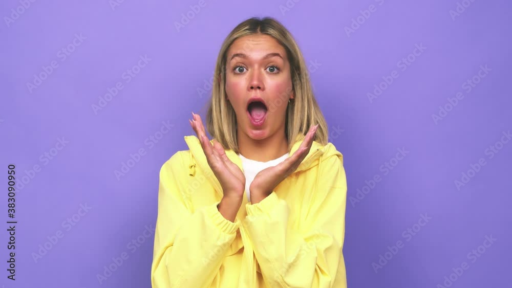 Young blonde caucasian woman surprised and shocked Young blonde caucasian woman surprised and shocked