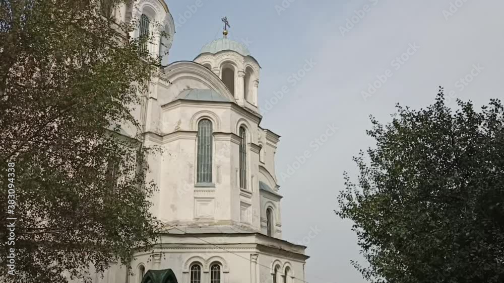church of the holy spirit. Red carnation flower lies on granite church of the holy spirit. Red carnation flower lies on granite
