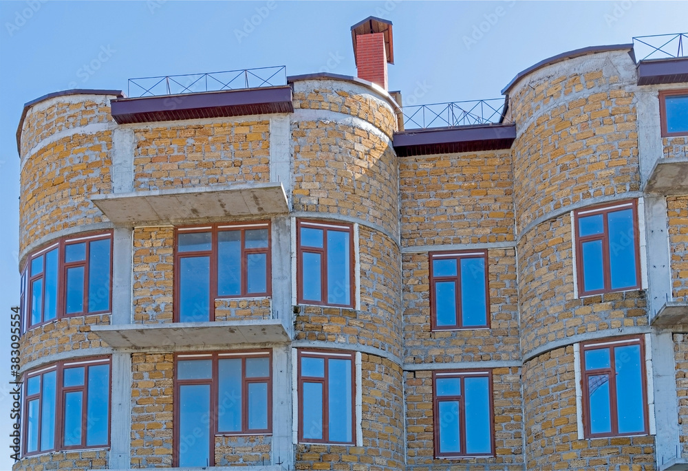 Naklejka premium unfinished house made of natural material