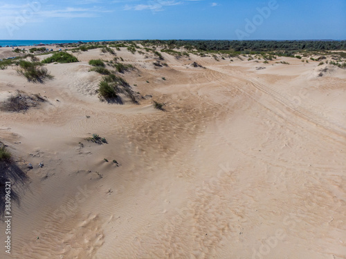 flight over the white sand dunes of the desert