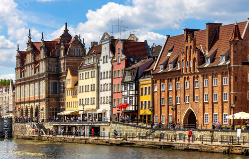 Historic Hanseatic tenement houses at Motlawa river embankment in old town city center of Gdansk  Poland
