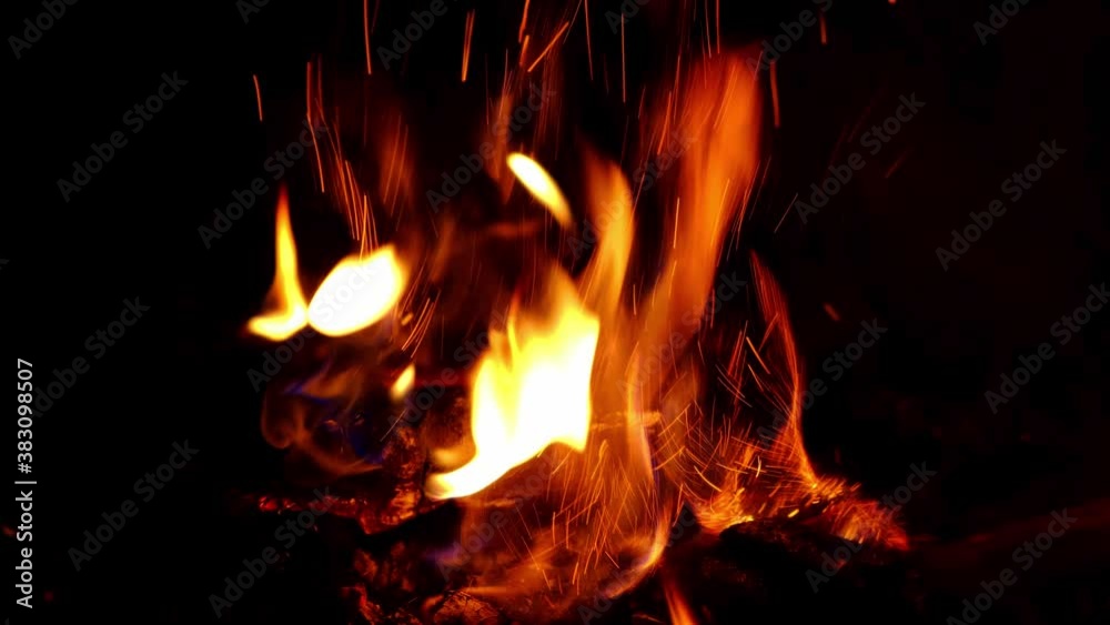 Fire close up, burning logs in the fireplace a hot flame. Fire close up, burning logs in the fireplace a hot flame.