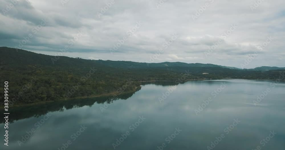 Drone aerial view of the jungles and beautiful clear lake Peten Itza, El Remate, Guatemala Drone aerial view of the jungles and beautiful clear lake Peten Itza, El Remate, Guatemala