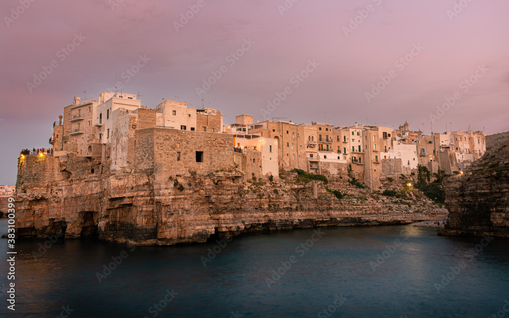 Pink sunset at Polignano a Mare, Puglia, Italy