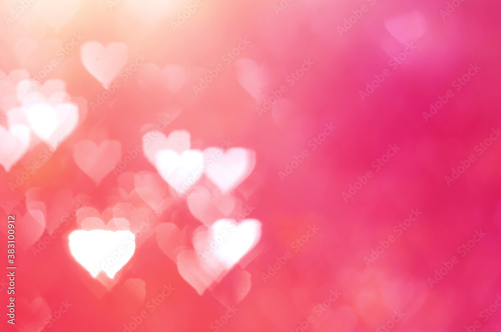 Defocused blurred heart shaped lights. Valentines Day background.