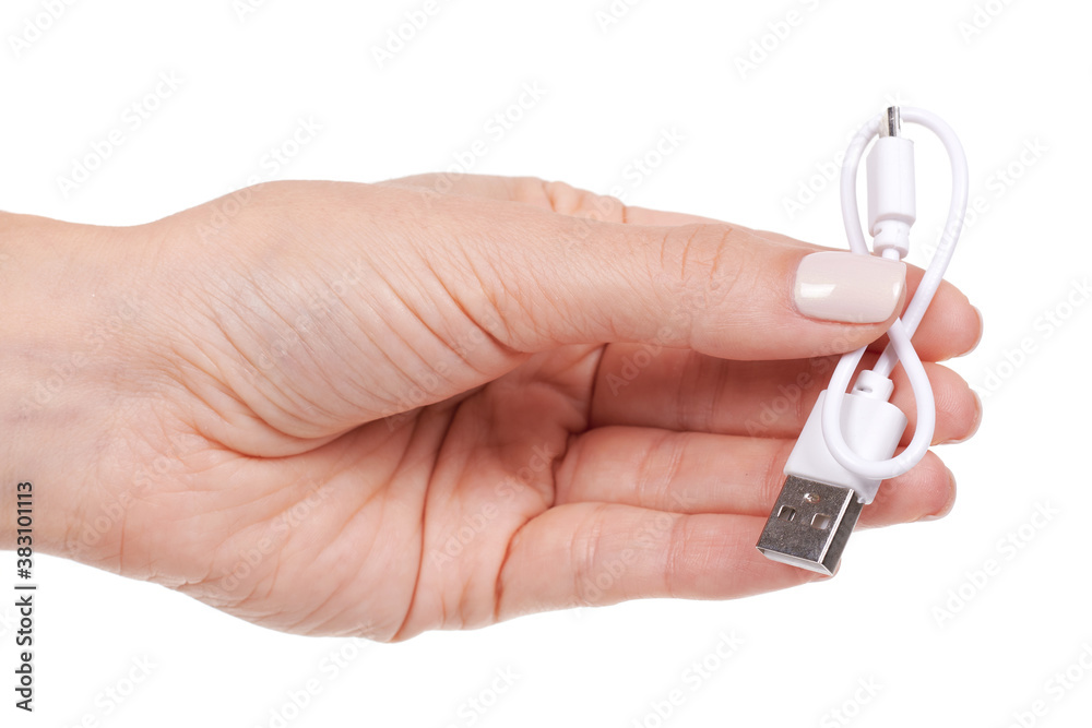 Hand with USB cable, connection wire. Isolated on white background.