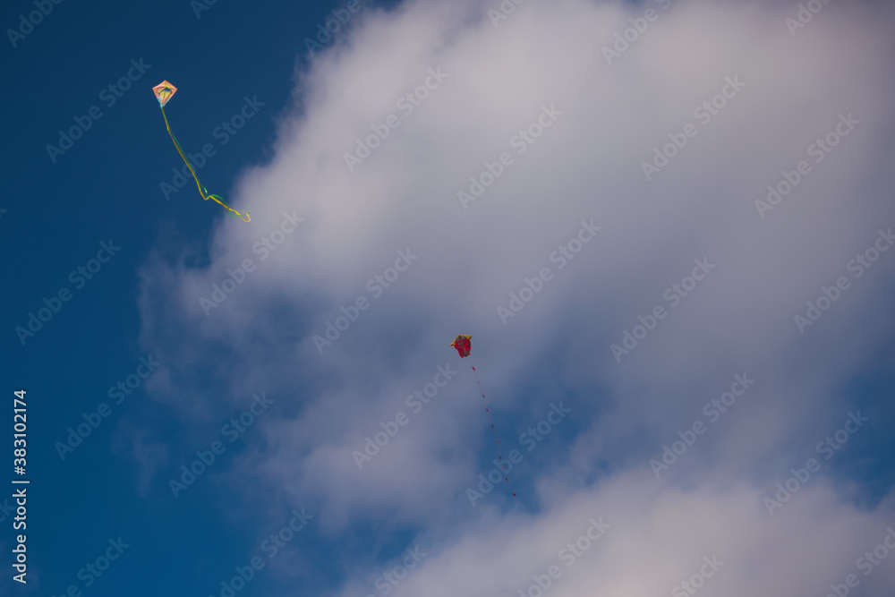 colorful kite flying up in the sky colorful kite flying up in the sky