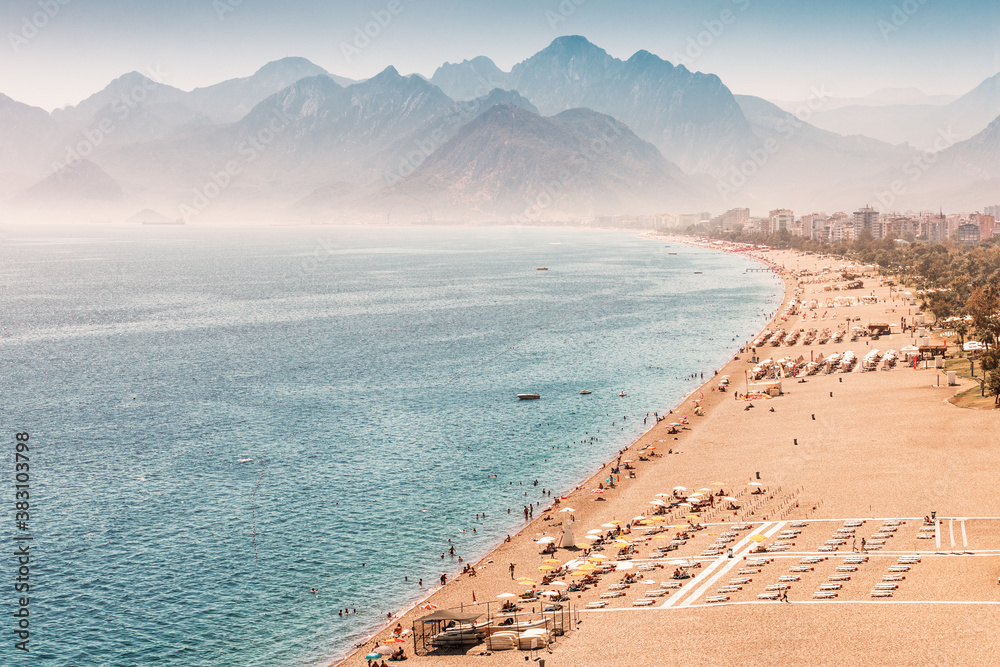 Fototapeta premium Aerial view of the famous longest Konyaalti beach in Antalya. Vacation and tour on the Mediterranean coast of Turkey
