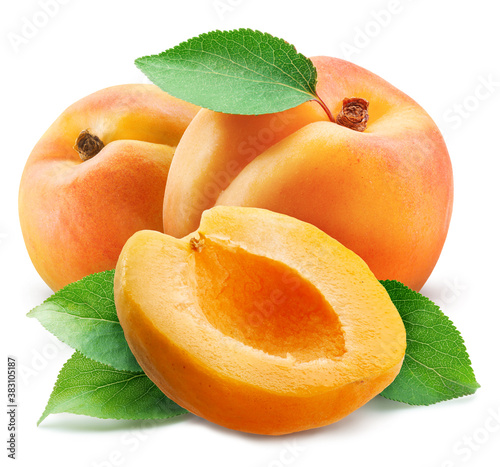Obraz na plátně Apricots with leaves and apricot slices isolated on a white background