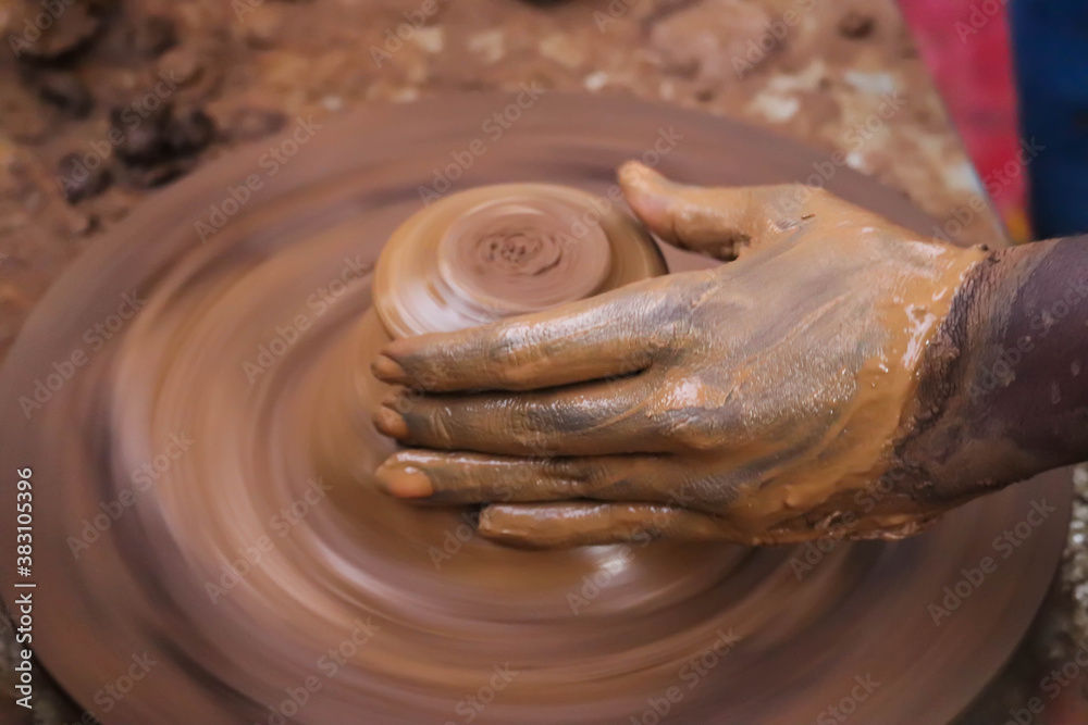 Hands And Fingers Posture Of Potter Making Pottery From Mud Using Spinning Potter Wheel Hands And Fingers Posture Of Potter Making Pottery From Mud Using Spinning Potter Wheel