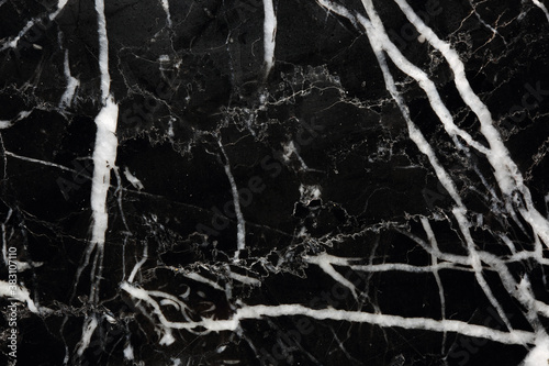White pattern detailed of black Marquina marble texture background for product design