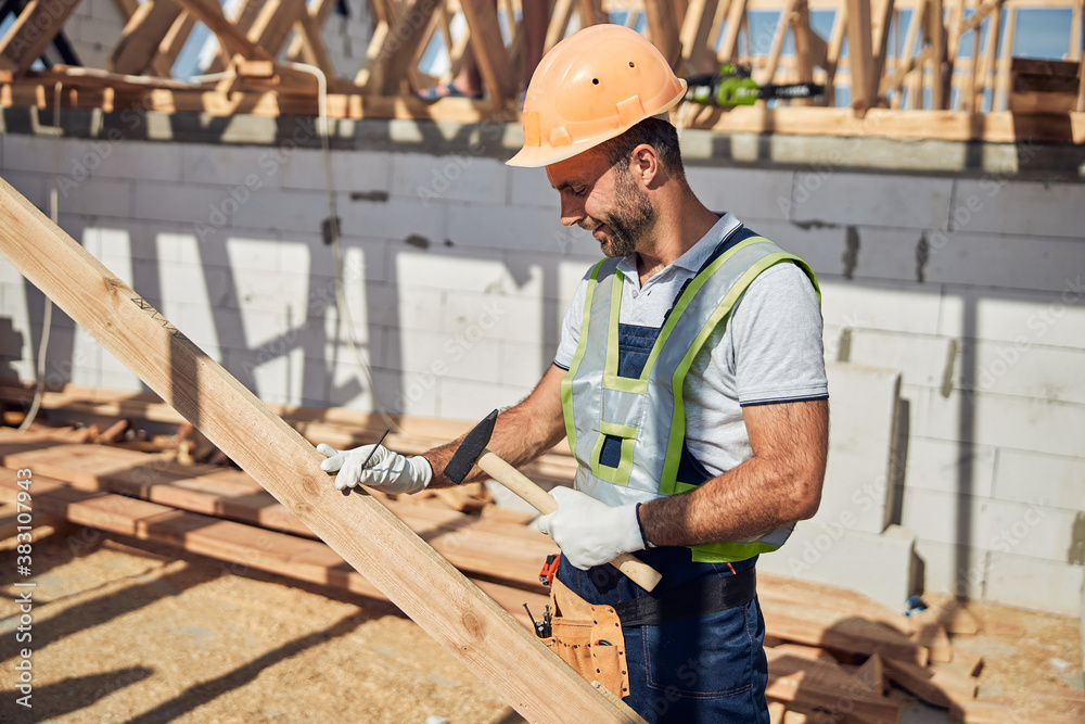 Cheerful young man working as foreman on the building Cheerful young man working as foreman on the building