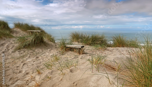 Obraz na plátně beautiful danish coastline with bench at spring