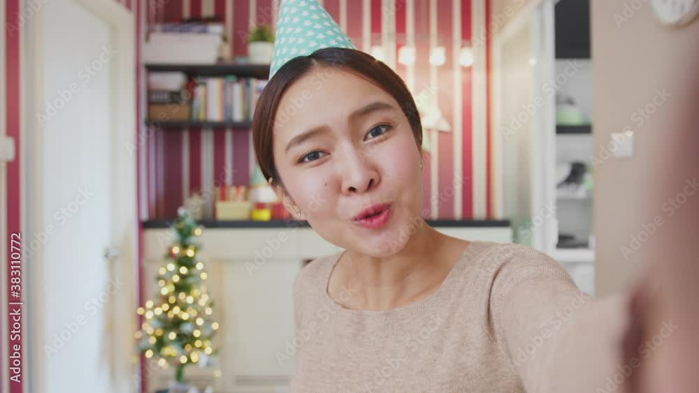 POV Asian woman giving gift or present to friends and family via video call conference. new normal for birthday, Christmas and new year party POV Asian woman giving gift or present to friends and family via video call conference. new normal for birthday, Christmas and new year party