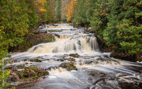 Water falls along Bad River at Copper Falls State Park during fall time 