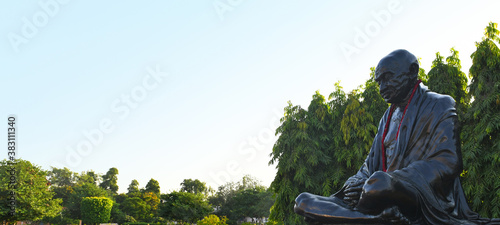 Black stone statue of the Father Of Nation Mahatma Gandhi, who employed nonviolent resistance to lead the successful campaign for India's independence from British rule. 