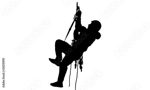 The rope access technician climbs to the top