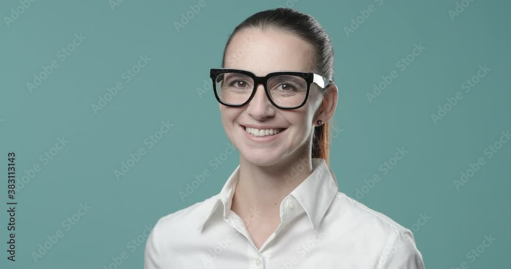 Smiling young businesswoman with glasses