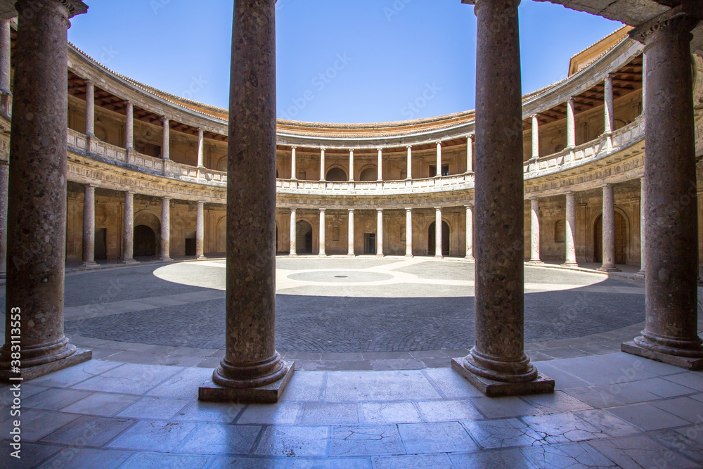 Fototapeta premium Round Patio and double colonnade of Charles V Palace, Granada, Andalusia, Spain