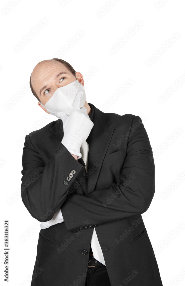 Handsome young business man with surgical medical virus protection white mask and gloves looking up isolated. Handsome young business man with surgical medical virus protection white mask and gloves looking up isolated.