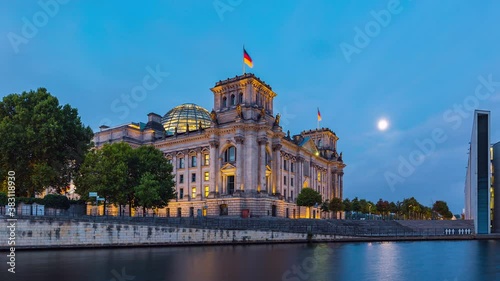 Night to Day Hyper Lapse of Reichstag Building with Spree River, Berlin, Germany photo