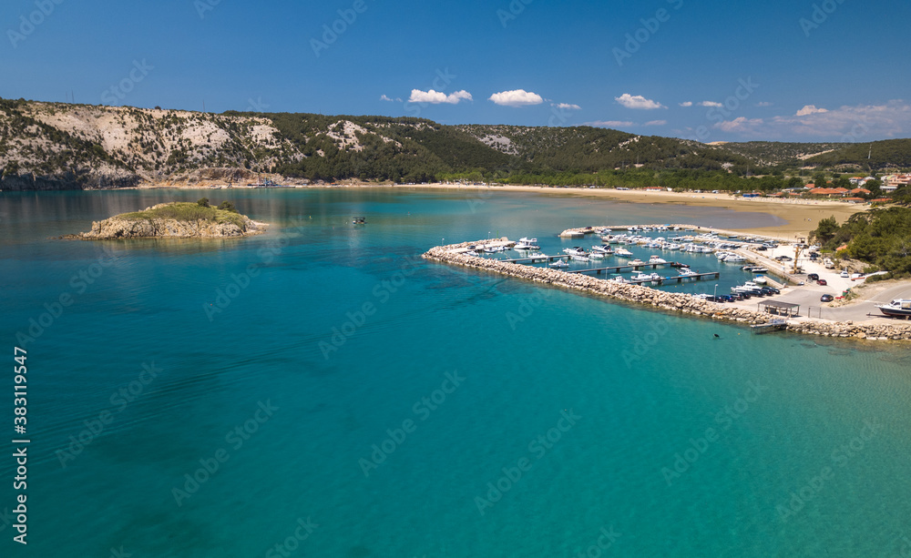 Aerial panorama of Rajska beach on the Rab island in Croatia. Paradise beach on the island of Rab in Croatia - the largest sandy beach in Lopar.