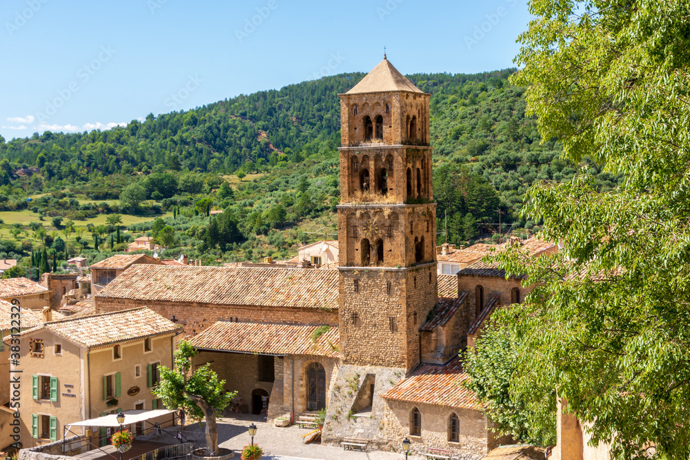 A view of Moustiers-Sainte-Marie, a quaint medieval village in the Provence region of France.