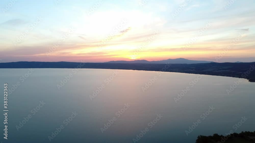 Aerial view of Lake Bolsena at sunset, a spectacular scenery. Water sky and nature Aerial view of Lake Bolsena at sunset, a spectacular scenery. Water sky and nature