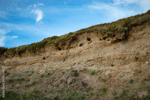 landslide on cliff, clay and sand