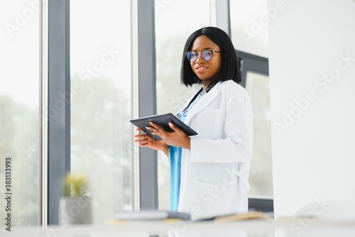 beautiful female african american medical nurse with stethoscope