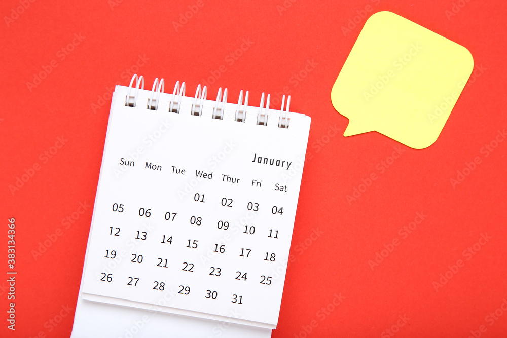 Calendar page with speech bubble on red background Calendar page with speech bubble on red background