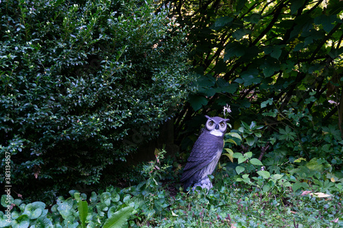 New York City / USA - October 3 20 2020: owl sculpture in Elizabeth Street Garden in Nolita, Manhattan, New York photo