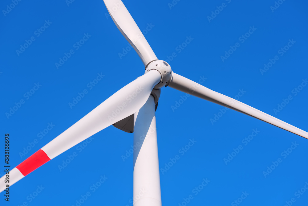 Wind turbines on sky background. Environment and renewable energy. Green energy. Wind turbines on sky background. Environment and renewable energy. Green energy.