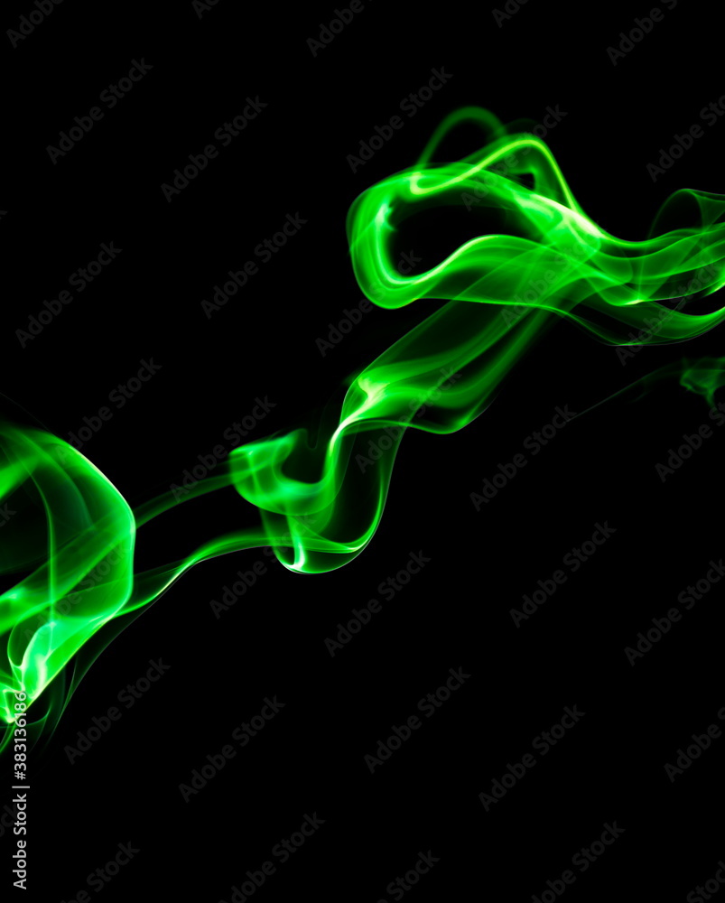 Green smoke on black background Green smoke on black background
