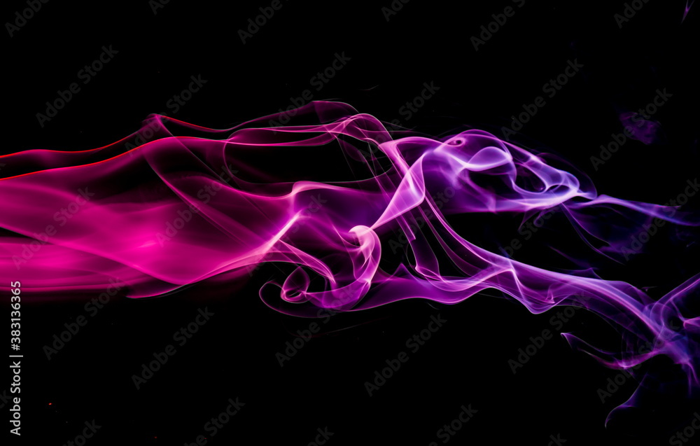 Colored smoke on black background Colored smoke on black background