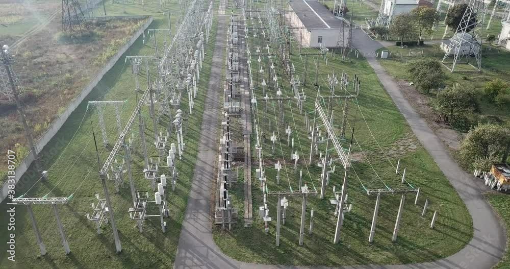 Transformer : The equipment used to raise or lower voltage, high voltage power station. Top view from flying drone Transformer : The equipment used to raise or lower voltage, high voltage power station. Top view from flying drone