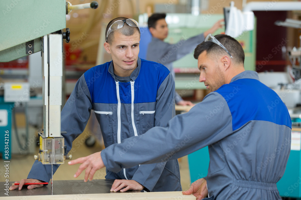 engineer and apprentice in factory engineer and apprentice in factory