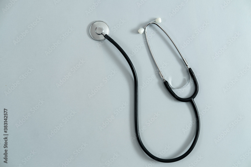 Stethoscope on gray background stock photo Stethoscope on gray background stock photo