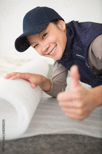 professional female cleaner showing thumb up